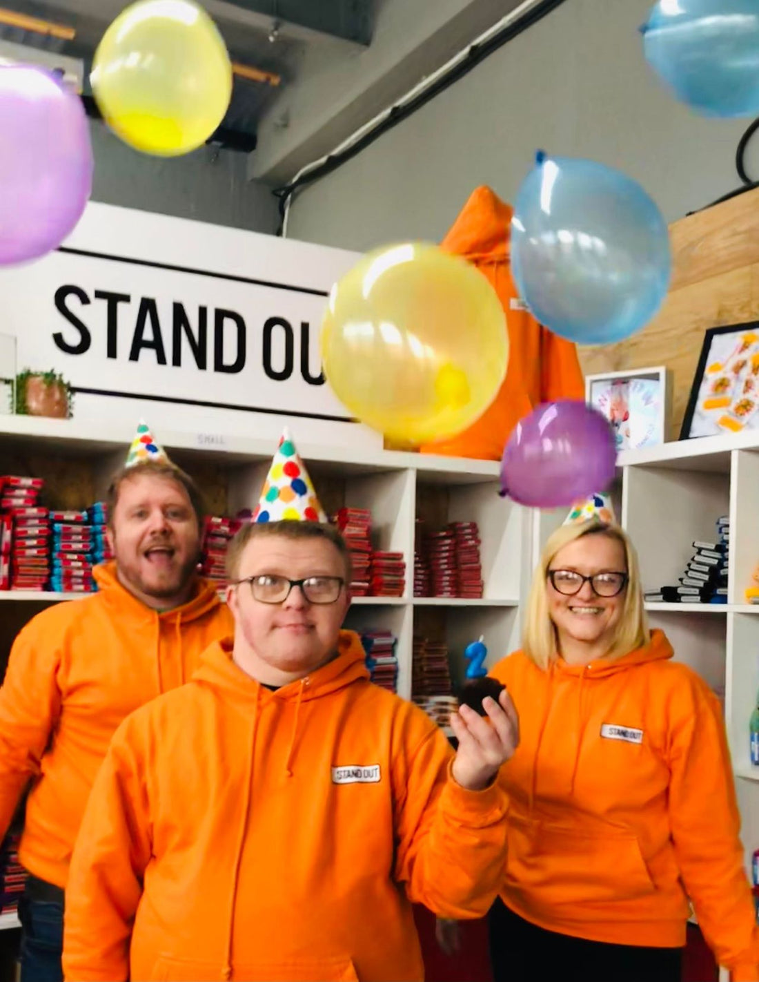 Stand Out Socks Co-Founders Christian, Ross & Natalie with party hats and balloons 