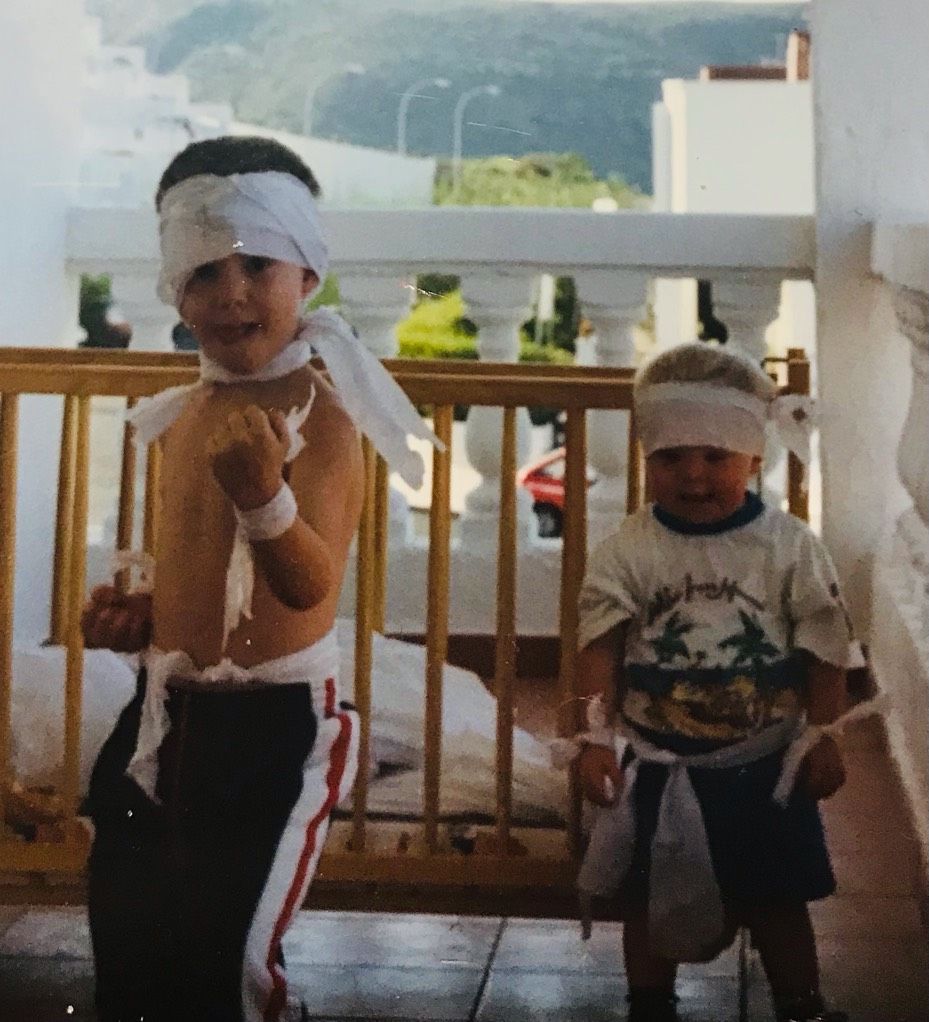 Childhood Photograph from 1990s of Two Boys with Toilet Roll wrapped around them