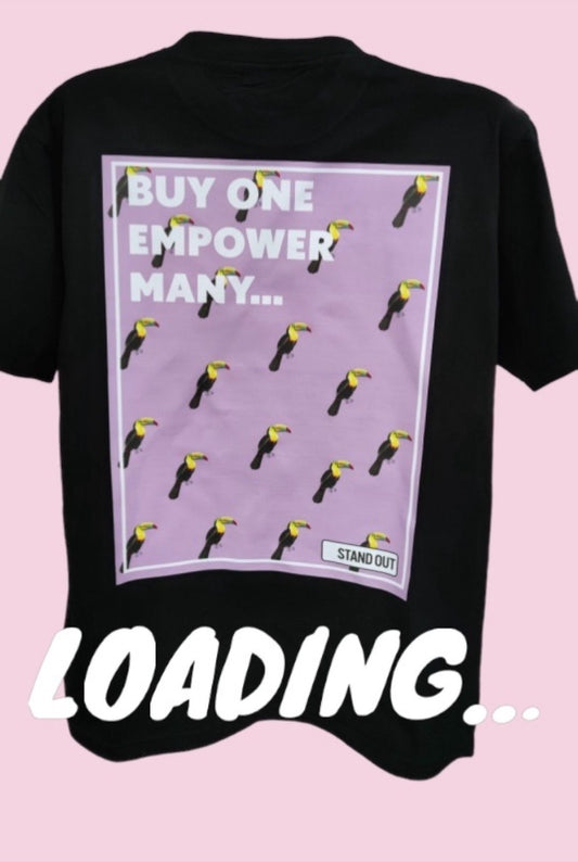 tshirt with toucans printed on the back and the words buy one, empower many