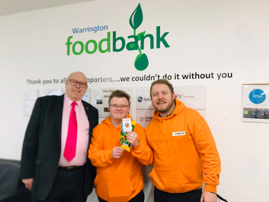 Ross and Christian from Stand Out Socks and David from Warrington Foodbank with the Launch of their new Charity Christmas Sock 