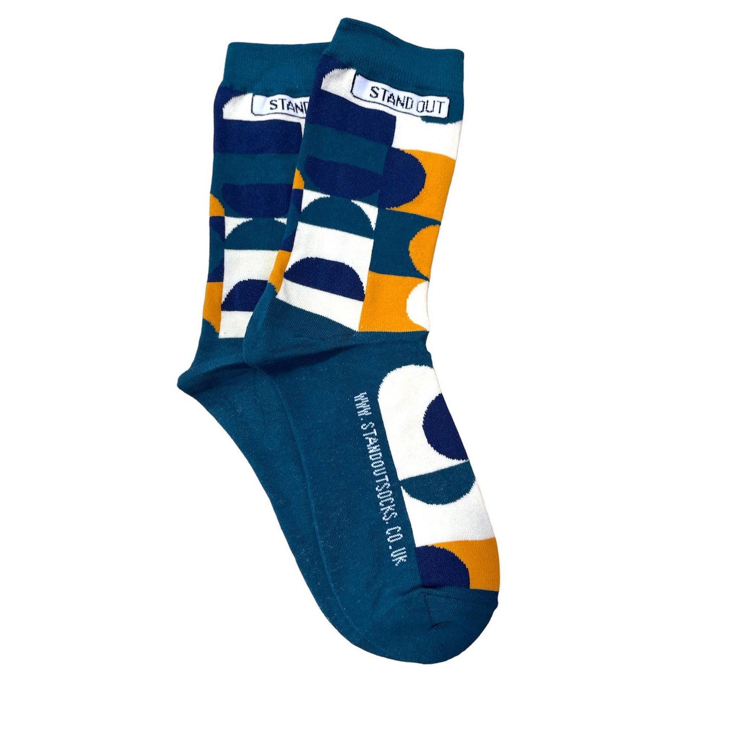 Green Socks with Orange, cream and navy geometric pattern by Stand Out Socks. The Stand Out logo on the top with the Stand Out website on the sole.