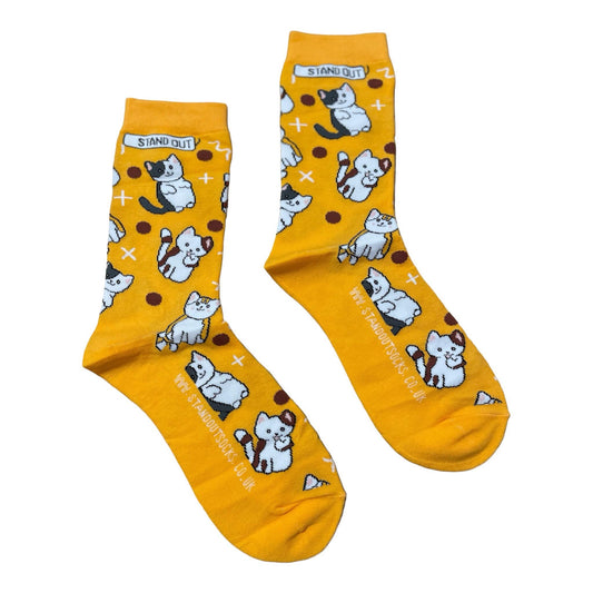 A Pair of orange socks with cat pattern and a stand out logo